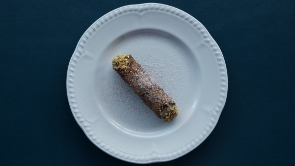 Wattleseed cannoli with ricotta and candied yuzu and chocolate.
