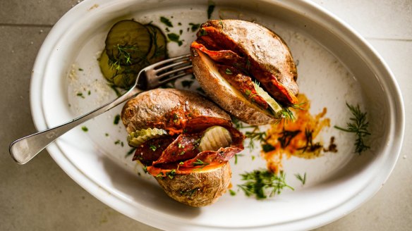 Baked potatoes with Bloody Mary butter, pickles and bacon.