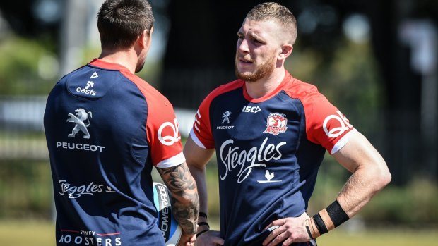 Under the wing: Roosters halfback Jackson Hastings (right) has been fielding advice from Mitchell Pearce.