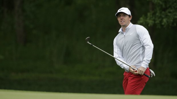 Weighing up withdrawl: Rory McIlroy.