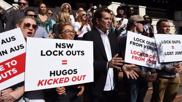 Hugo's Lounge owner Dave Evans and staff protest against NSW lock-out laws. The now-shut Kings Cross bar is being considered as a location for the hearings.