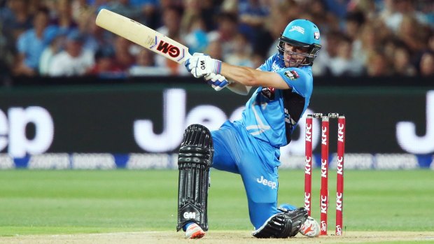 Six shooter: Travis Head of the Adelaide Strikers smashes another maximum against the Sixers.
