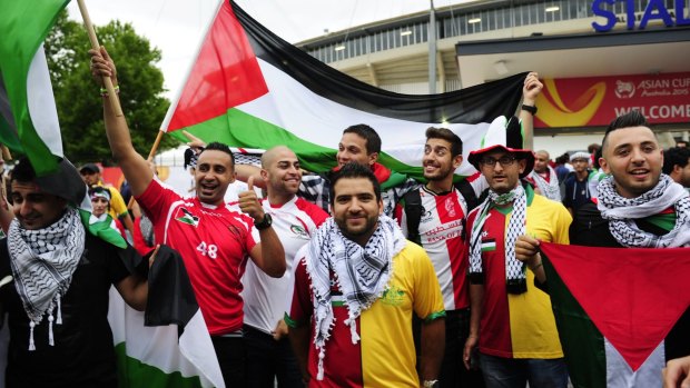 One team: Mohammad Othman of Melbourne at Canberra Stadium to see Iraq take on Palestine in the Asian Cup. 