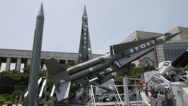 South Korea's mock missiles are displayed next to North Korea's mock Scud-B, left, at the Korea War Memorial Museum in Seoul.