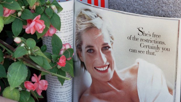 A past issue of <i>Vanity Fair</i> magazine lies open to a photograph of Princess Diana at a memorial in San Francisco following her death.