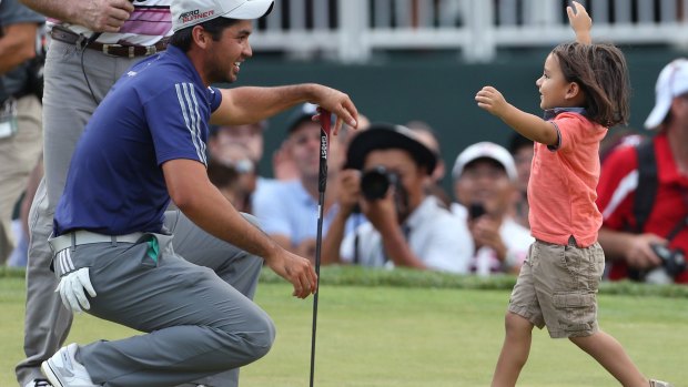 Like father, like son: Jason Day with his son Dash.