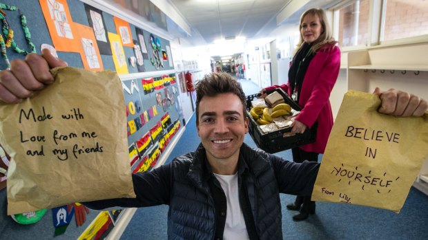 Eat Up's Lyndon Galea with Lalor East assistant principal Linda Richards.