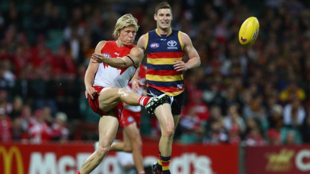 Isaac Heeney, of the Swans, looks upfield during the first semi-final match against the Adelaide Crows on Saturday night.