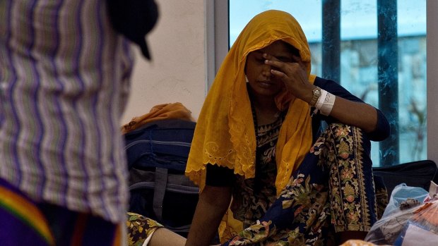 Rohingya migrants wait at a temporary detention centre in Langkawi, Malaysia on Tuesday.   