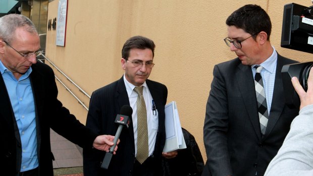 Inquest: Strata manager Peter Poulos, of RW Realty, leaves Glebe Coronor's Court.