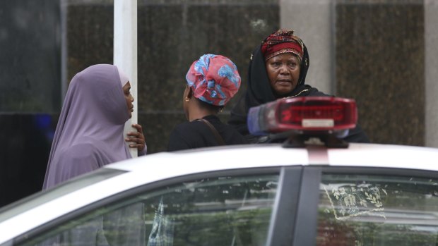 Ibrahim Jalloh's relatives at Guangzhou People's Intermediate Court, in Guangdong on Friday. 