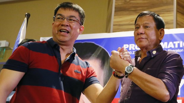 Mayor Rodrigo Duterte, right,  is officially declared the presidential candidate of the PDP-Laban political party by its president, senator Aquilino "Koko" Pimentel, in November last year. 