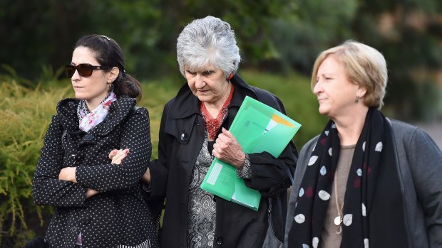 Lucina Boldi, centre, previously told a court she pretended to play dead during the home invasion.