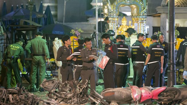 Police investigate the scene at the Erawan Shrine after an explosion in Bangkok,Thailand, on August 17.