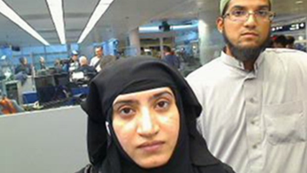 Tashfeen Malik and Syed Farook, as they passed through O'Hare International Airport in Chicago, last year. 
