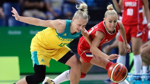 Australia's Erin Phillips and Serbia's Milica Dabovic chase a loose ball during a women's quarter at the Rio Olympics.