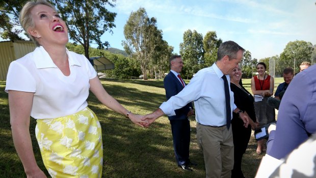 Opposition Leader Bill Shorten grabs Chloe's hand after he is asked about his birthday present. 