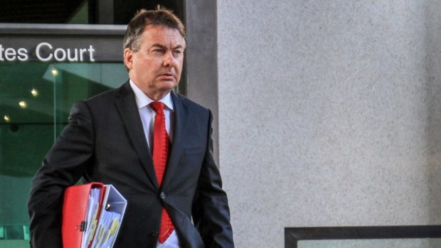 Walter Sofronoff QC leaves the Brisbane Magistrates Court on the first day of the Royal Commission into Institutional Responses to Child Sexual Abuse.