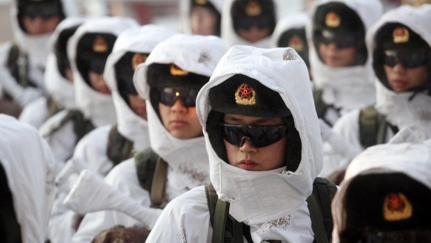 Chinese People's Liberation Army  soldiers line up during a winter training drill in Heihe in north-eastern China's Heilongjiang province.