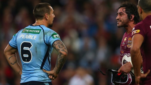 Sledgehammer: Johnathan Thurston gives Mitchell Pearce a form assessment.