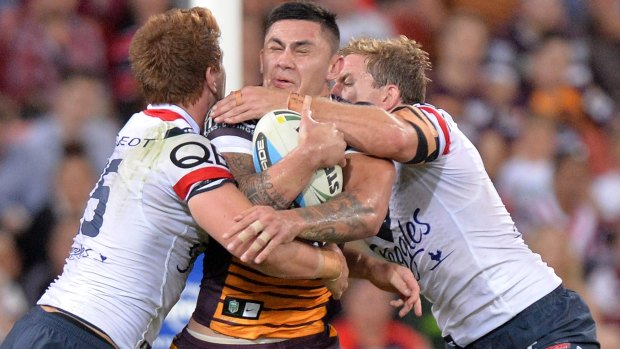On the move: Broncos winger Daniel Vidot takes on the defence during the round six NRL match between the Brisbane Broncos and the Sydney Roosters at Suncorp Stadium.