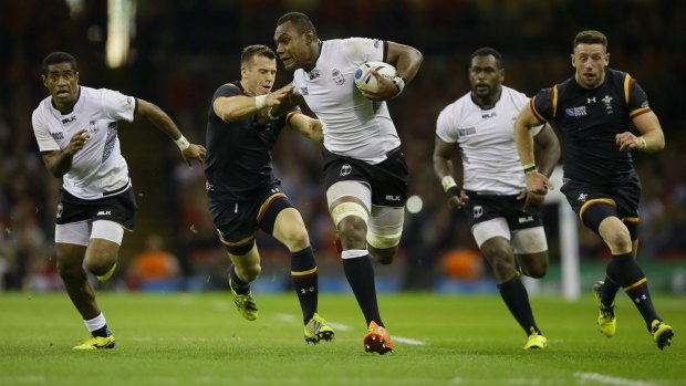 Fiji's Leone Nakarawa makes a break against Wales.