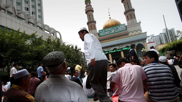 Uighur ethnic minority worshippers take part in Friday noon prayers in Urumqi, China.