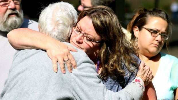 Friends and family are reunited with students after the shooting.