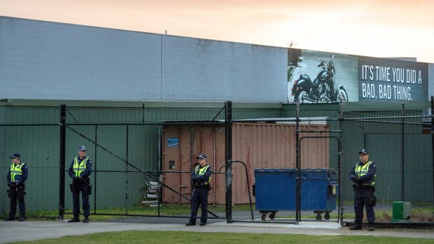 Police outside the Coffin Cheaters clubhouse in Braeside on Friday morning. 