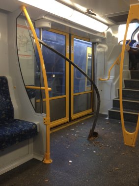 The metal bar that tore through the floor of the third carriage and hit its ceiling.