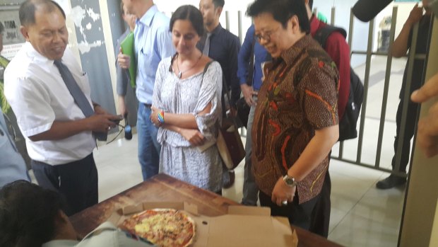 Sara Connor's lawyers take pizza to her inside Kerobokan jail on Tuesday.