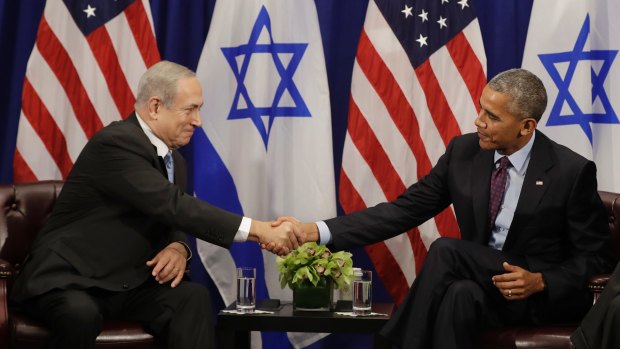 US President Barack Obama shakes hands with Israeli Prime Minister Benjamin Netanyahu during a bilateral meeting at the Lotte New York Palace Hotel on Wednesday.