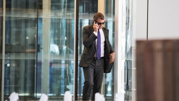 Mike Baird leaving the Deutsche Bank building in Sydney earlier this month. 