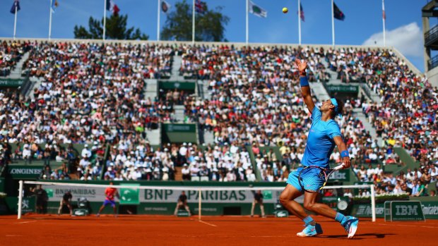 Rafael Nadal serves up a straight sets win over  Andrey Kuznetsov on day seven of the French Open.