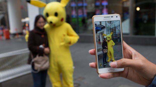 Scavenger hunt: Pokemon Go's augmented reality allows players to locate and collect fictional creatures in the real world.