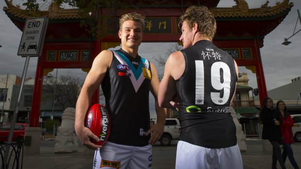 Slow burn: Port Adelaide players Ollie Wines (left) and Matthew White; the club is pushing on with its China initiative.