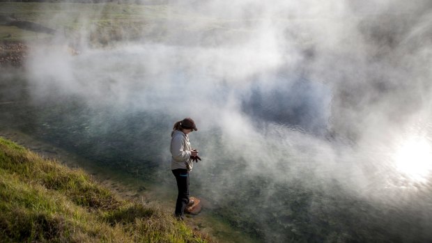 Princeton student Rachel Harris collects microbes from a hot spring in western South Africa. 