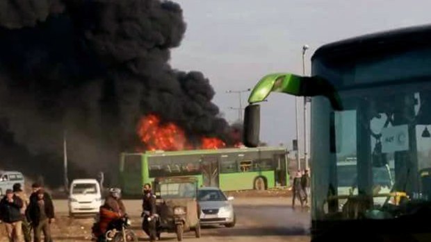 Activists said, militants burnt at least five buses assigned to evacuate wounded and sick people from two villages in northern Syria. 