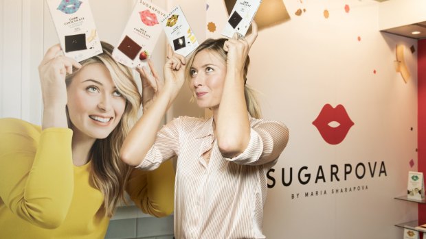 Making most of time out: Maria Sharapova, serving a doping ban, clowns around at the launch of her confectionery line last month.