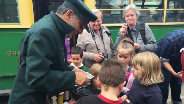 "Connies" performer Roberto D'Andrea is a hit with both young and old at the Kew Tram Depot centenary.