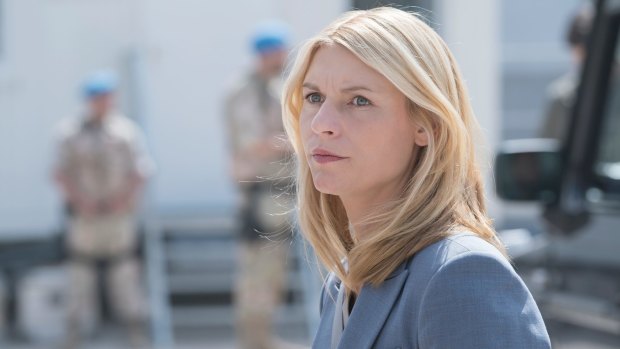 Artists have "hacked" Homeland, which stars Clare Danes, by writing subversive messages in set graffiti.