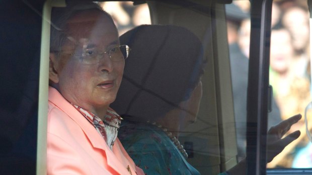 King Bhumibol Adulyadej and Queen Sirikit leave Siriraj hospital in Bangkok in August 2013.