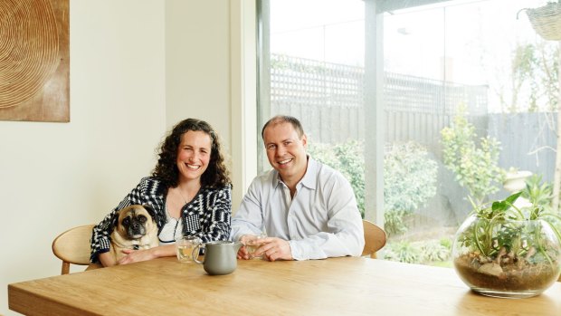 At home with wife Amie and dog Fonzi.