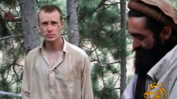A frame grab from a 2010 video released by the Taliban showing Bowe Bergdahl with one of his Afghan captors.