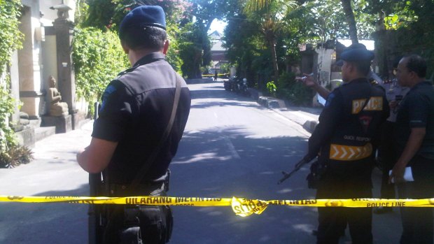 The Bali bomb squad cordon off the area in front of the home of the Australian Consul-General.
