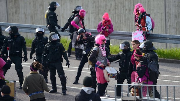 Anti-AfD demonstrators and police clash near the party's federal congress at the Stuttgart Congress Centre on Saturday.