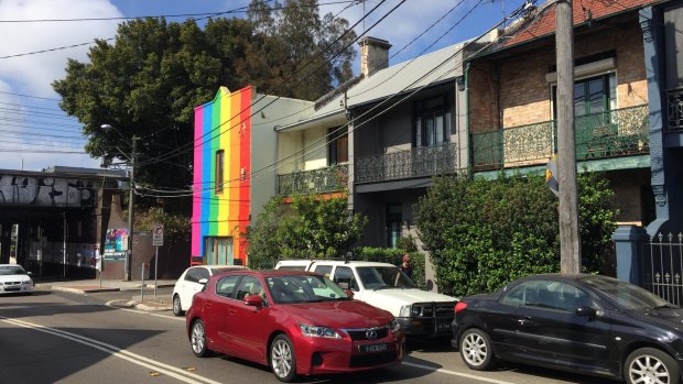 An Enmore resident has painted a rainbow down the front facade of his property in support of same-sex marriage.