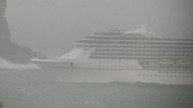 The Carnival Spirit going through the Heads during the storm on Wednesday.