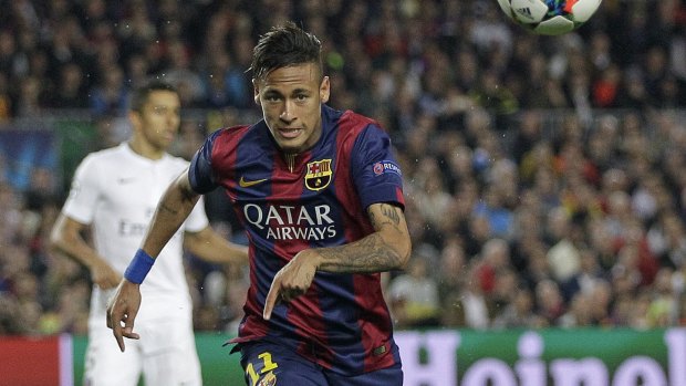 Untouchable: Neymar races after the ball.