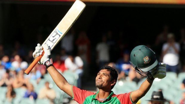 Bangladesh batsman Mohammad Mahmudullah celebrates after reaching his century.